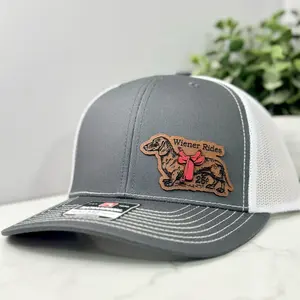 Dachshund rides 25 cents hat
