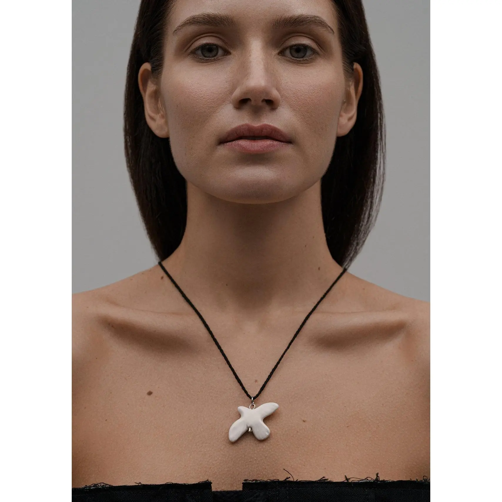 Dove pendant on a cord "MYRNI"
