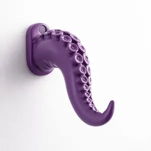 A Single Piece of a Creatively Designed Wall Hook Shaped Like an Octopus Tentacle, Suitable for Hanging Various Items Such As Clothing, Bags, Towels, And Bathrobes, Serving As Both a Bathroom Accessory And Home Decoration