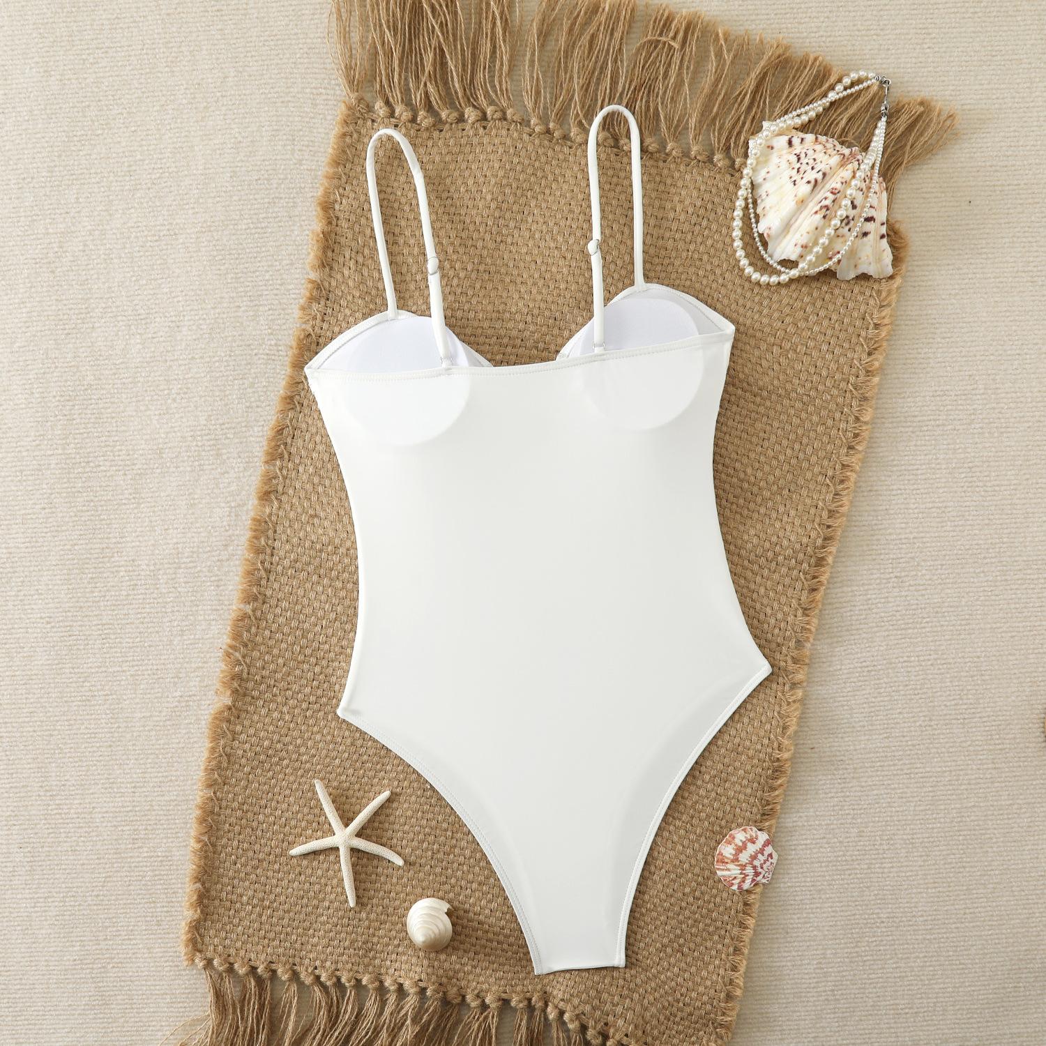 European and American sexy slim-fit women's swimwear wholesale in Xingcheng, nylon swimsuit with metal shell decoration, one-piece swimsuit