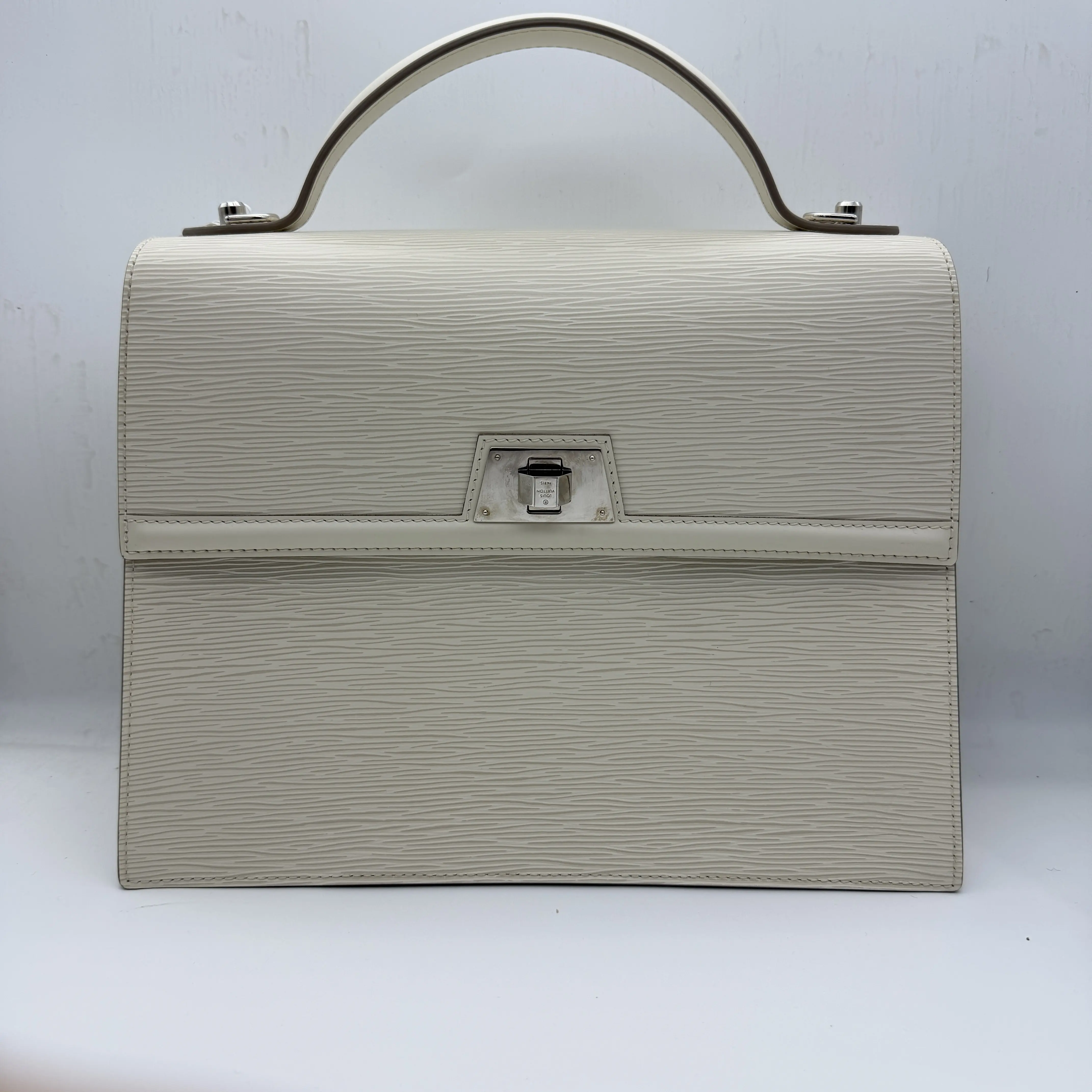 Pre-owned Louis Vuitton Segur briefcase crafted from off white Epi leather with silver tone hardware