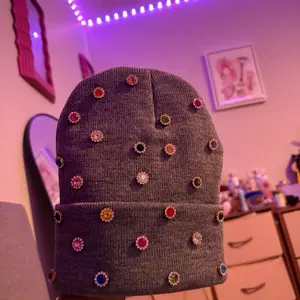 Grey Jeweled Beanie with Colorful Accents and Round Design