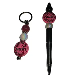 I know your lane s*cks pen and keychain bundle
