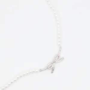 Radiant Pearl Ribbon Necklace