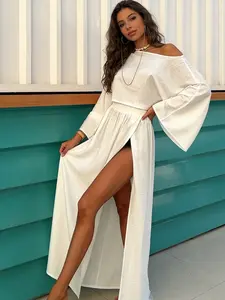 Two-piece women's white loose short-sleeved diagonal off-shoulder long-sleeve sun-protection top slit long dress set suitable for spring and summer, suitable for travel and vacation wear.