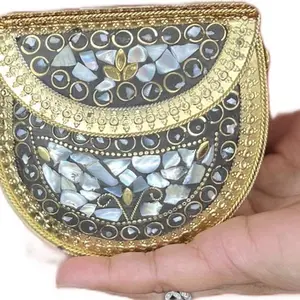 Mother of Pearls Clutch - Elegant Gold Trimmed Design with Intricate Shell Patterns and Decorative Elements