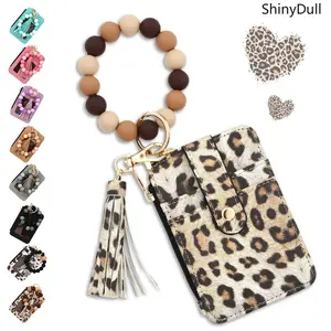 RFID Slim Wristlet Wallet for Women – Silicone Bracelet Keychain Card Holder with Tassel