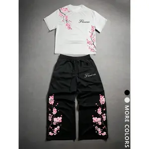 Unisex Y2K Style Sakura Two Piece Set, Cherry Blossom Print Short Sleeve T-Shirt & Wide Leg Sweatpants, Japanese Floral Streetwear, Summer Casual Wear For Anime Fans And Streetwear Lovers