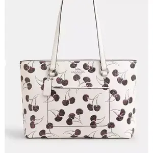 Pre-owned Coated Canvas Tote Bags Coach Station Tote Bag with Cherry Print