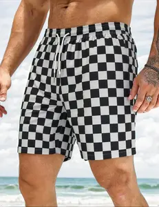 SUMIMERVIBESMen’s black and white checkerboard print swim shorts — quick-drying drawstring casual beach shorts with an elastic waistband design; summer vacation casual surfing shorts; summer seaside casual swim shorts, vacation shorts