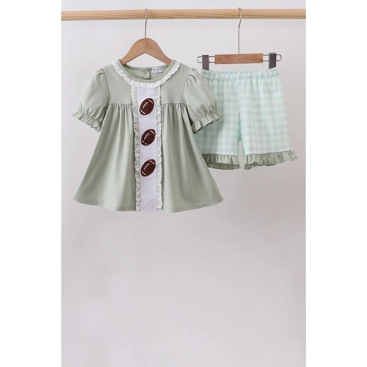 Green football french knot gingham ruffle shorts set