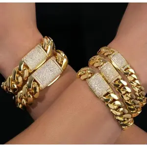 The Classic  Clasp Gold color Cuban Cuban Bracelet  5A Cubic Zirconia, Iced-Out Clasp,| Luxury 14K Gold Bracelet  Non-Tarnish Stainless Steel, The Bracelet size is 7.5/8.5 inches   Hip Hop Jewelry Stylish Statement  Accessory