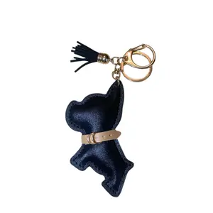 ChicPup Dog Charm Faux Leather Keychain with Gold Hardware and Tassel Detail for Stylish Pet Owners