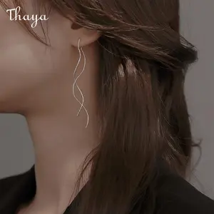 Thaya Textured Waving Tassel Long Earrings