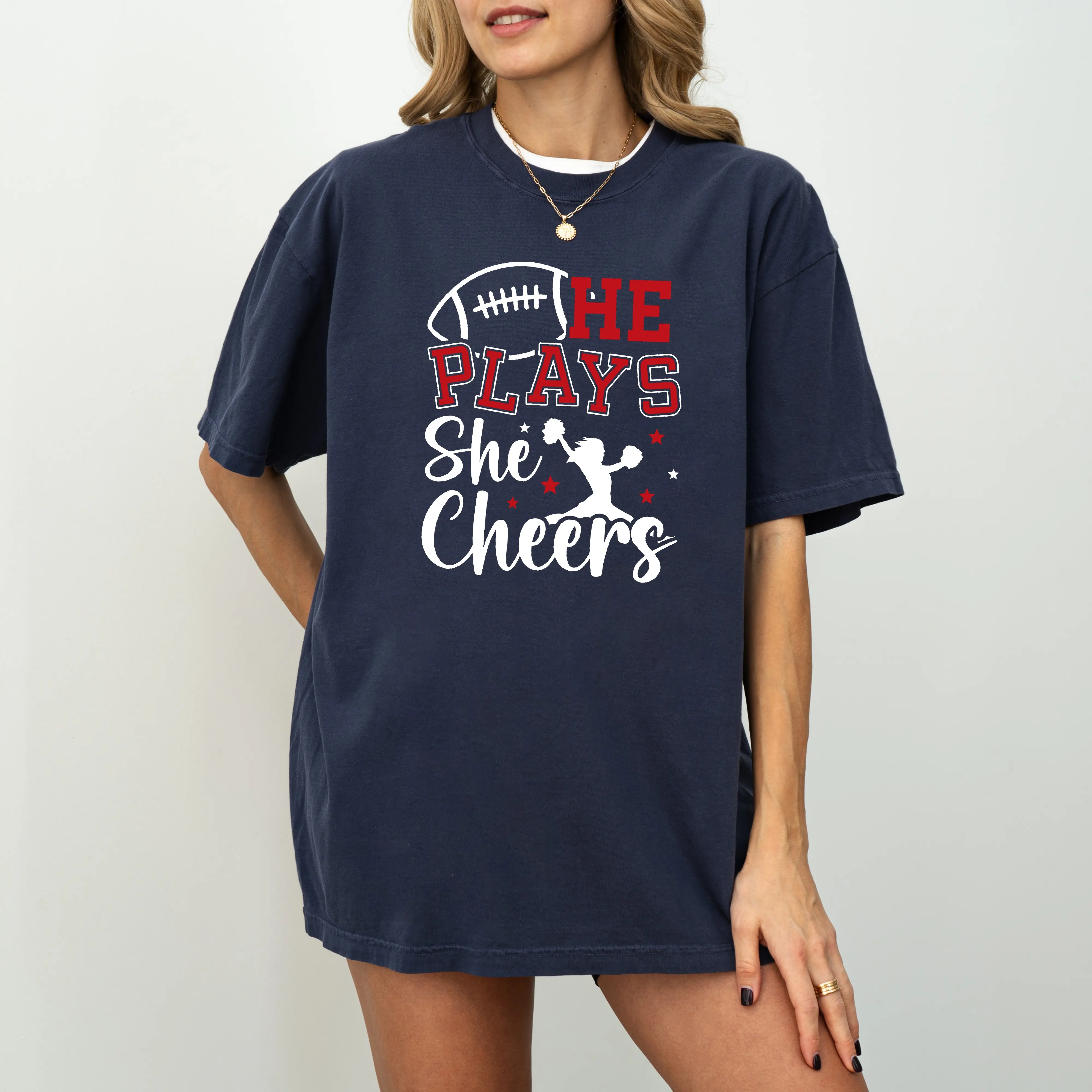 He Plays She Cheers Shirt, Football and Cheer Couple Tee, Game Day Sports Graphic, Oversized Team Spirit Gift 2026