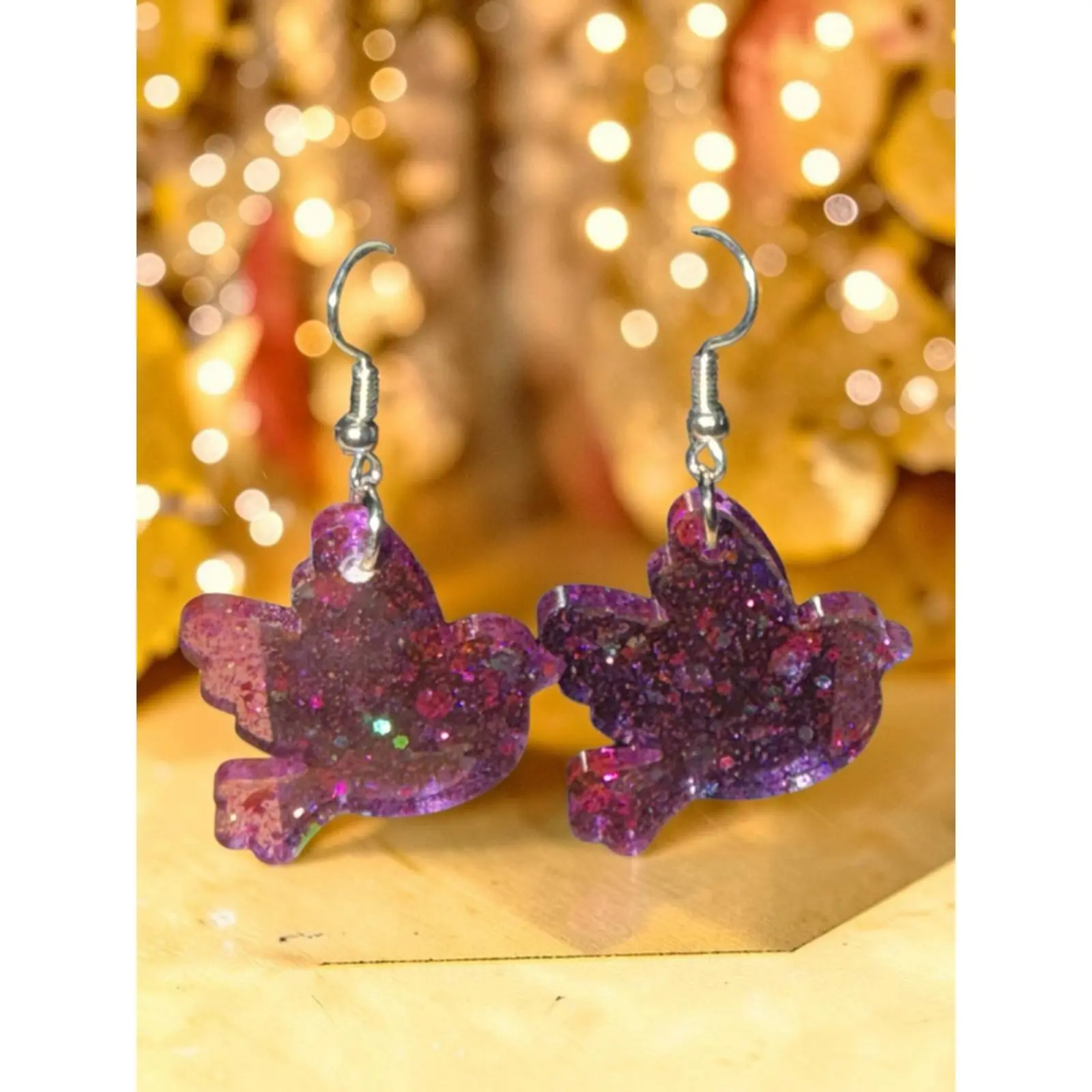 Angel Trumpet LLC Handmade Purple Glitter Bird Resin Dangle Earrings with Multicolor Sparkle Accents and Silver-tone Fishhook Ear Wires