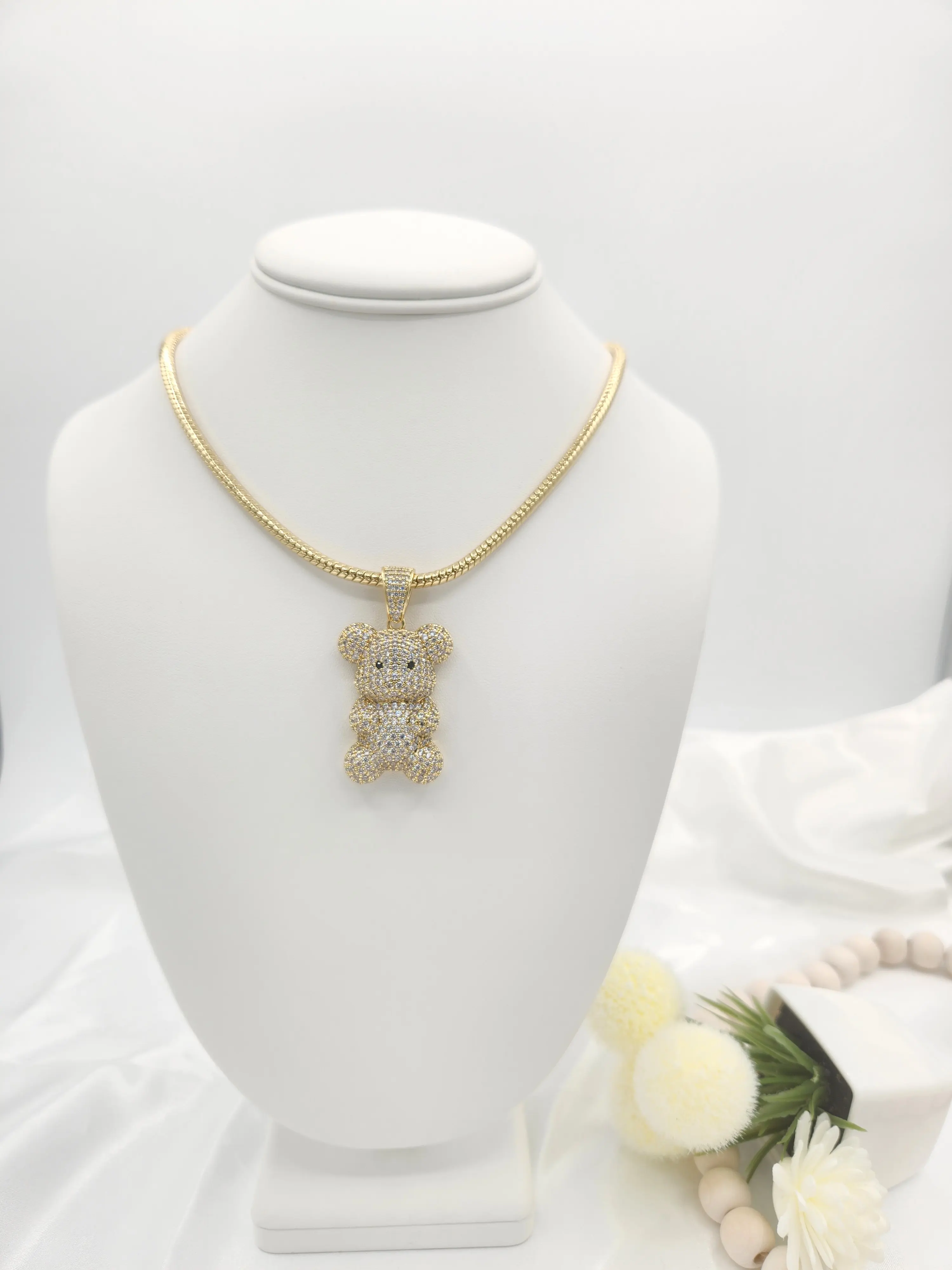 Womens chains with various zircon stone charms made of 14k gold plated. (38)