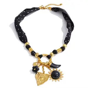 Collar Noir Mystique with Gold Accents and Polka Dot Design for Stylish Accessory