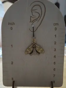 Yellow moth Plastic dangly earrings