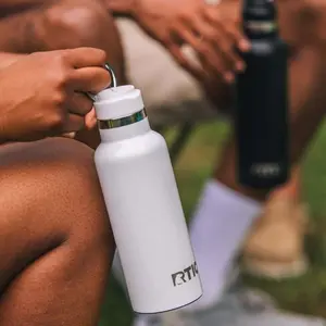 RTIC 20 oz Ceramic Lined Insulated Journey Water Bottle with Leak-Proof Lid White Glitter Finish for On-the-Go Hydration