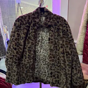 Fluffy leopard fur coat