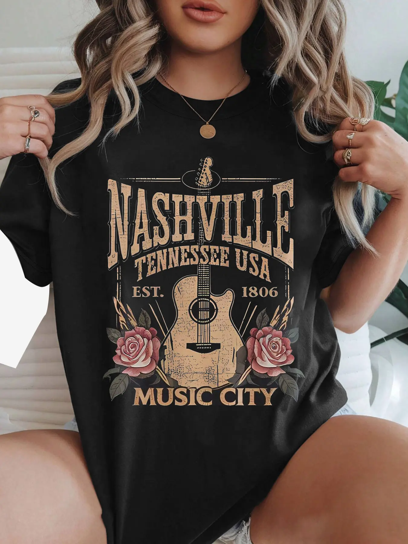 Women's Vintage Nashville Loose T-Shirt, Music City USA Aesthetic Floral Design with Guitar and Roses, Soft Comfortable Top, for Casual Outfits and Travel