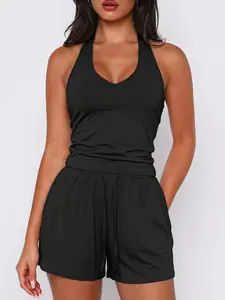 Women’s knit two-piece set available in four colors: halter V-neck top with solid drawstring shorts. Comfortable sports-casual outfit for summer daily wear, home, and vacations.