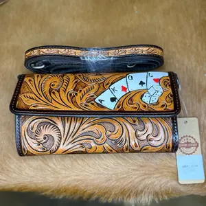Handcrafted Leather Wallet with Intricate Floral Design and Poker Card Accents