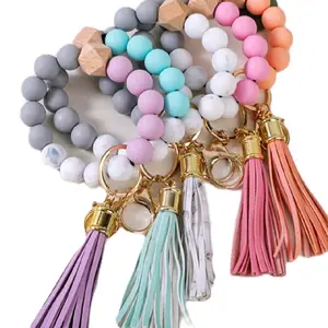 Silicone Key Chains with Wording and Wooden Charm Featuring Colorful Beads and Tassels