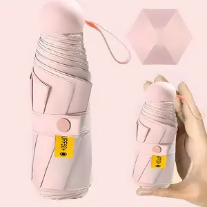 Travel Umbrella for Sun & Rain Portable Pocket Umbrella 1 Count Lightweight Folding UV Protection Unisex Design with Optional Shoulder Strap Ideal for Travel & Outdoor Activities Black Cover