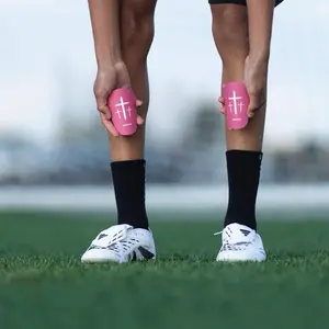 Momentum Pink Cross Shin Mini Guards 4x3in Minimalist Functional Football Equipment Accessories for Enhanced Performance