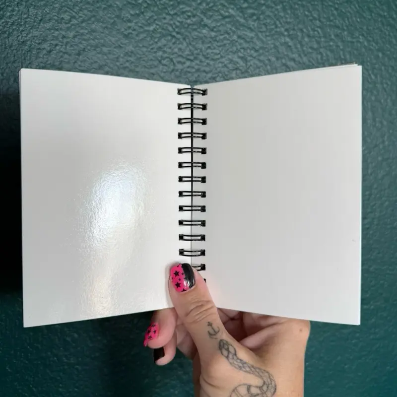 B7 sized reusable sticker book - 3.58”x5.04” - 50 sheets/100 pages