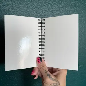B7 sized reusable sticker book - 3.58”x5.04” - 50 sheets/100 pages