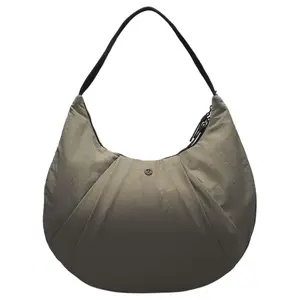 Lululemon Pleated 10L Logo Zipper Crossbody Bag in Green-Gray and Black for Women