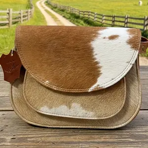 Crossbody Cowhide Bag - Genuine Leather with Distinctive Cowhide Pattern & Secure Closure for Everyday Use