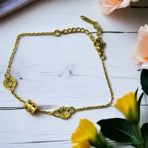 Timeless Glow - Roman Numeral Charm Bracelet Gold-Tone Chain with Textured Barrel Bead Adjustable Length Lobster Clasp JewelryTok GoldBracelet RomanNumerals LayeredLook