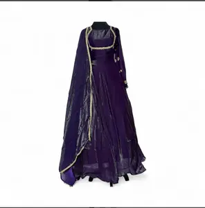 Elegant Purple Evening Gown with Gold Embroidery and Flowing Skirt for Special Occasions