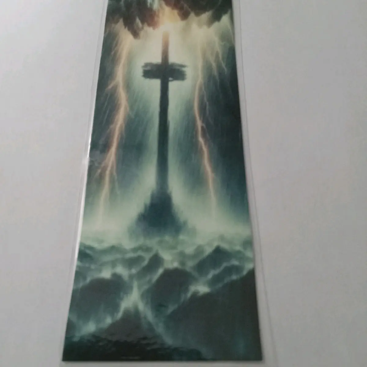 Cross in a Storm Laminated Bookmark - Features Lightning and Stormy Atmosphere Design