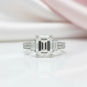 Classic Three Stone Emerald Cut Engagement Ring