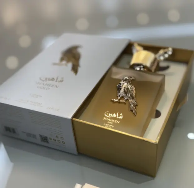 Lattafa Shaheen Gold for Unisex Regular Edition Aromatic Adventure with Citrusy & Floral Notes 3.4 Fl. Oz. Elegance Fragrance