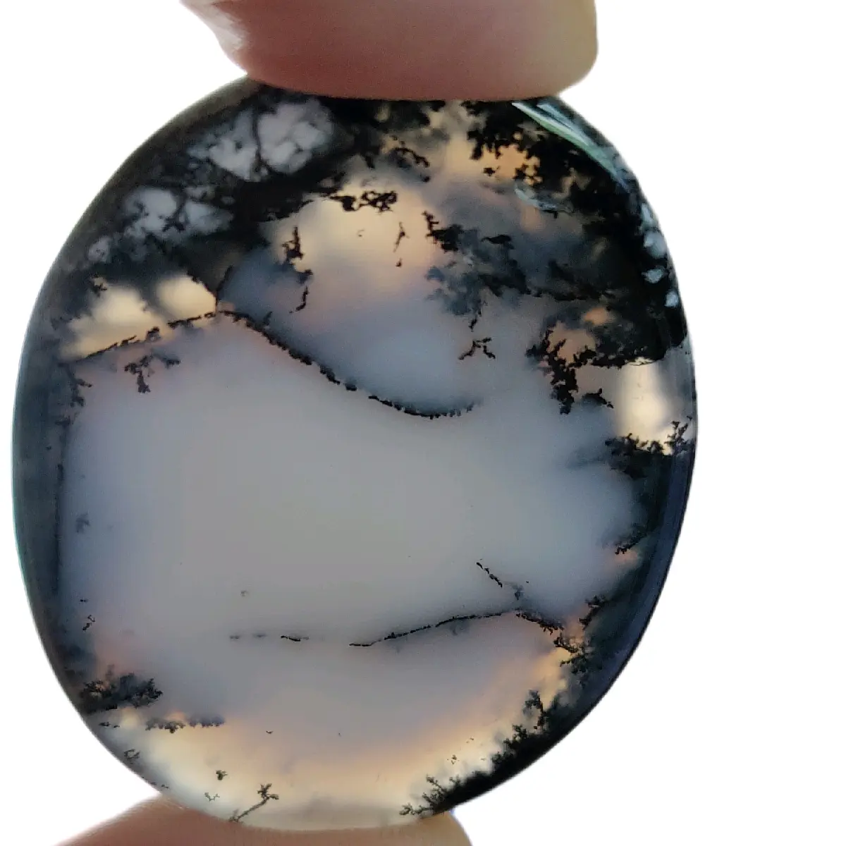 Dendrite Opal  aka Merlinite  cabochon weighing just over 13 grams