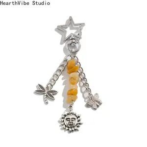 HearthVibe Studio European and American Retro Moon Sun Pendant Irregular Gravel Keychain with Butterfly and Dragonfly Charms