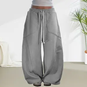 Women’s casual athletic pants with elastic waistband and drawstring, women’s jogging pants, wide-leg casual pants with side pockets, comfortable and breathable, suitable for everyday wear and outdoor activities.