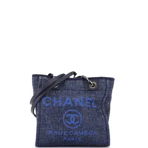 Pre-owned CHANEL Raffia Shoulder Bags North South Deauville Tote with Glitter Detail Small by Rebag