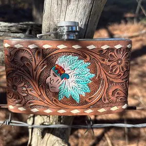 Tooled leather bottle