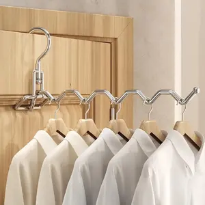 Foldable stainless steel clothes hanger, multifunctional portable clothes rack, space-saving, essential for travel, lightweight, suitable for home, hotel, and daily clothing organization