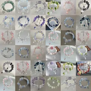 15/25pcs Stylish And Elegant Stackable Bracelets for Teenager, Featuring Sparkling Cracked Glass Beads Paired with Floral, Butterfly, Feather, Star, And Bow Pendants. This Unique Design Is Shipped Randomly And Is Perfect for Valentine'S Day