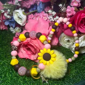 Sunny sass  wristlet and phone charm set color scheme chocolate, yellow, light pink, leopard and bling beads hand made with wire