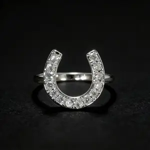 Minimalist crystal statement ring.Silver tone U-shaped ring.Dainty lucky jewelry.Pave-set round crystals.High-shine faceted stones.Good Luck Charm Horseshoe Ring.Minimalist everyday ring.Everyday lucky accessory.