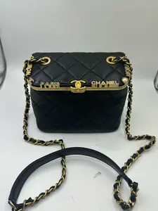 Pre-owned CHANEL 23C Black & Gold Lambskin Quilted Vanity Case – Lambskin with Enamel Letter Logo, Microchip Version, 99% New, Size: 17 × 14 cm